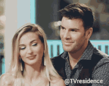 a man and a woman are standing next to each other with a caption that says tvresidence