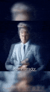 a man in a suit and tie is standing with his arms crossed and the words lg7 administrador on the bottom .