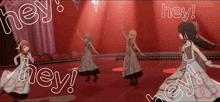 a group of anime girls are dancing on a stage with the words hey surrounding them