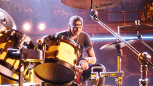 a man playing drums with a zildjian cymbal behind him