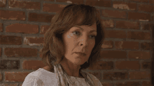 Serious Face Sue Buttons GIF - Serious Face Sue Buttons Allison Janney GIFs