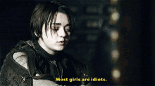 a woman says most girls are idiots in yellow letters