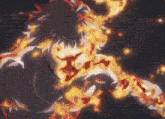 a person is surrounded by flames on a dark background .