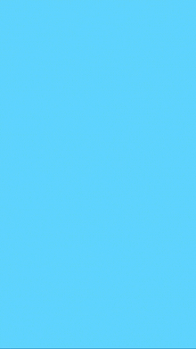 a man in a hard hat and blue shirt is dancing