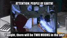 a computer screen says attention people of earth tonight will be two moons in the sky
