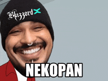 a man wearing a black beanie that says blizzard on it
