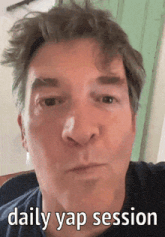 a close up of a man 's face with the words daily yap session on the bottom