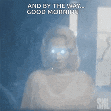 a snl animated gif of a woman with glowing eyes saying good morning