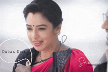 a woman in a red saree is smiling with the words daraa diya written in a speech bubble