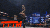 a wrestling ring with the word all in on the side