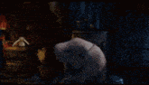 a person 's hands are reaching out towards a woman in a video game scene