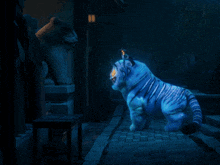 a blue tiger is flying through the air with the words adios chat written below it