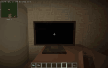 a computer monitor with a white cross in the middle