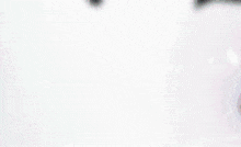 a colorful background with a few white letters and a few flowers
