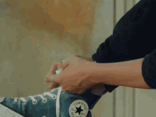 Lacing Up - Millie Bobby Brown X Converse Gif GIF - First Day Feels Converse Forever Chuck GIFs