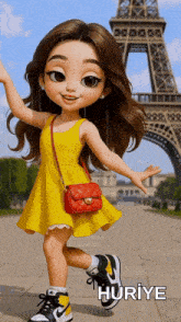 a little girl in a yellow dress is standing in front of the eiffel tower with the name huriye on the bottom