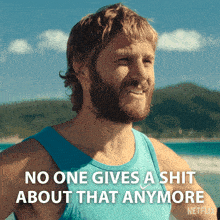 a man in a blue tank top says no one gives a shit about that anymore netflix