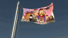 a flag that has a picture of a boy and a monster on it