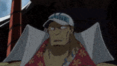 a man wearing a white hat that says marine on it