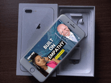 a phone with built on empathy written on the screen