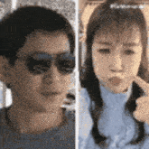 a man and a woman are taking a selfie together .