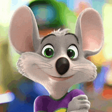 a cartoon mouse with green eyes is wearing a purple shirt .