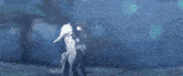 a boy and a girl are standing next to each other in a dark room