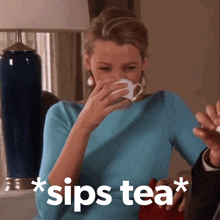 a woman drinking a cup of tea with the words * sips tea * behind her