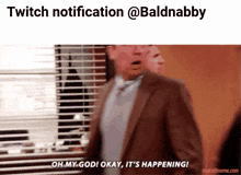 a man in a suit and tie says " oh my god okay it 's happening "