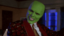 a man with a green mask on his face