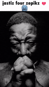 a black and white photo of a man with his hands folded and the words " jastiz four zepikz " above him