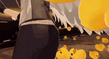 a person is standing in front of a pile of rubber ducks .