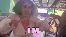 a woman in a white dress says i 'm in a bowling alley