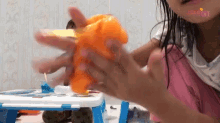 Diremas Remas Slimenya Membuat Slime GIF - Diremas Remas Slimenya Membuat Slime Slime Oranye GIFs