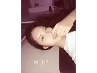a woman 's face is shown with the words " wth " next to her