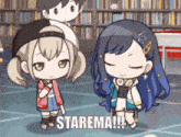 two little girls are standing next to each other in a library and one of them is saying starema .