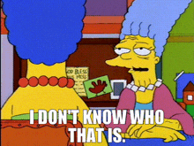 a cartoon character from the simpsons is sitting next to another cartoon character .