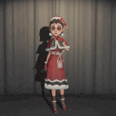 a girl in a santa hat is holding a christmas tree