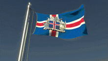 a blue white and red flag with the word iceland on it
