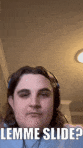a man wearing headphones says " lemme slide "