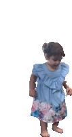 a little girl in a blue dress with flowers on the bottom