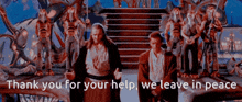 two men standing in front of a group of statues with the words thank you for your help we leave in peace