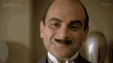Smile Poirot GIF - Smile Poirot Smirk GIFs