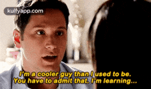 a man is talking to a woman and says i 'm a cooler guy than i used to be
