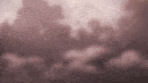 a painting of a cloudy sky with a few trees in the background