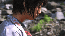 a close up of a person 's face with tv tokyo written on the bottom