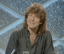 Robert Plant Thinking GIF - Robert Plant Thinking Ponder The Answer GIFs