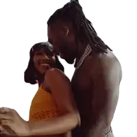 a shirtless man is hugging a woman in a yellow dress .