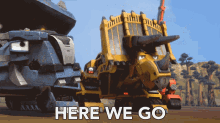 a picture of a robot with the words here we go written below it