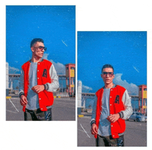 a man wearing sunglasses and a red jacket with the letter a on it is standing in front of a blue sky .